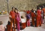 Waiting with Peter (15) for Bhagwan to drive by, in Rajneeshpuram, in 1984